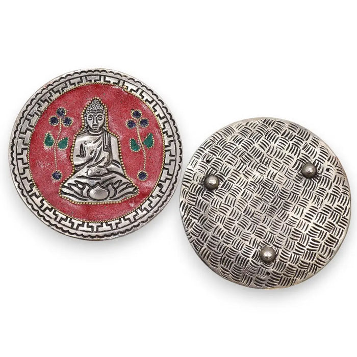Silver incense holder with red enamel buddha face and green blue floral details made of polished aluminium