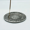 Silver-toned round polished aluminium incense holder with om symbol and intricate paisley mandala patterns