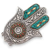 Polished aluminium incense holder with small silver hamsa featuring turquoise mosaic and red gemstone accents