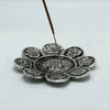 Silver floral incense burner with intricate petal engravings and central pattern in polished aluminium finish