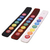 Three mango wood incense holders in black brown and white with seven chakra symbols printed in rainbow colors