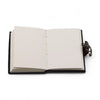 Black leather notebook with cream pages and metal clasp in a printed leather notebook stop doom scrolling 7 by 5 inches