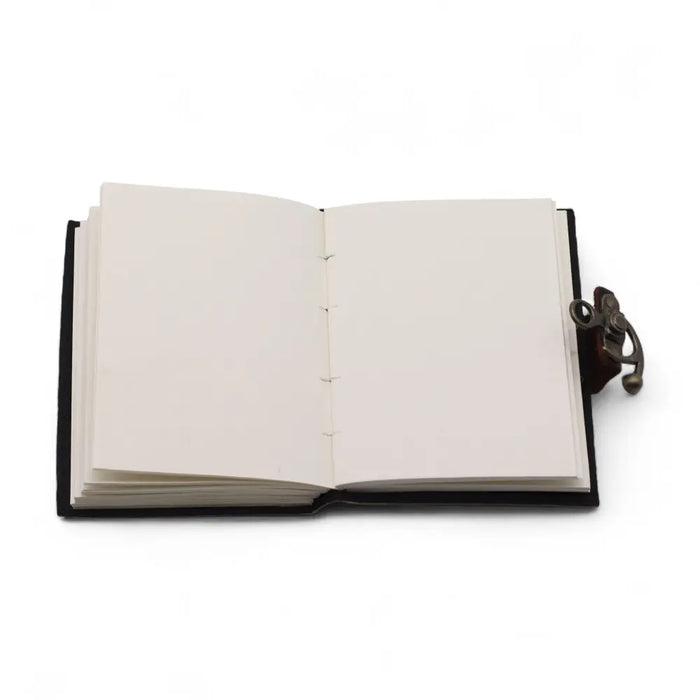 Black leather notebook with cream pages and metal clasp in a printed leather notebook stop doom scrolling 7 by 5 inches