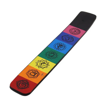 Printed mango wood ash catcher in rainbow colors with seven chakra symbols in black outline for incense sticks