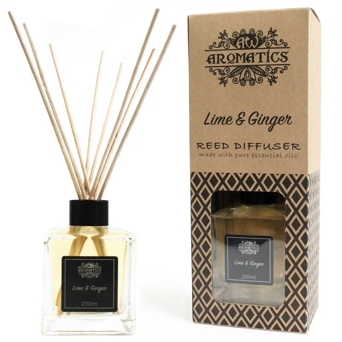 A clear glass reed diffuser with black cap and wooden reeds filled with golden essential oils in 200ml bottle
