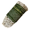 A rolled bundle of light beige twisted himalayan lemongrass incense ropes with a dark green label wrapped around it