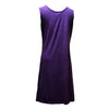 A sleeveless tunic dress in purple cotton with stitched flowers and patches and a simple round neckline and straight hem