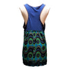 Blue and teal peacock-eye patterned sleeveless dress with dark blue straps next to purple cotton embroidered smock vest with butterfly motif