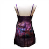 A vibrant purple tie-dyed patchwork cotton dress with spaghetti straps and a flowing skirt