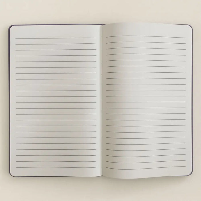 Open notebook with lined pages and a dark purple velvet cover from the purple velvet notebook 80 pages create magic series
