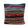 Vibrant rag rug cushion cover with aqua blues and layered textured stripes in earthy and bold hues