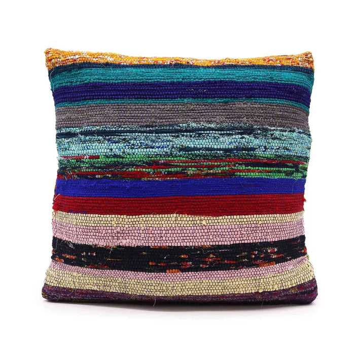 A vibrant handwoven rag rug cushion cover in charcoal greys with multicolored stripes of teal purple red and beige yarns
