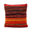 Vibrant rag rug cushion cover in rich reds featuring red orange and brown stripes with a textured woven fabric finish