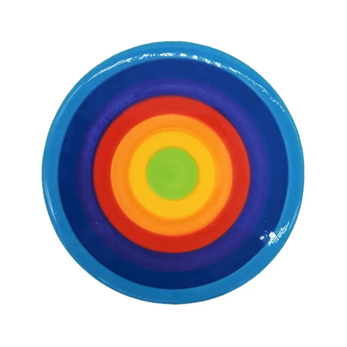 A glossy 10cm rainbow coaster yo-yo with circular rings of blue purple red orange yellow and green