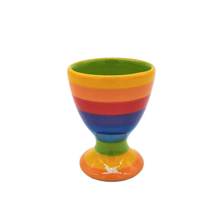 Rainbow-striped ceramic egg cup with green interior and a small white horse design on the base