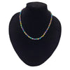 A vibrant rainbow hematite faceted bead necklace with iridescent glass beads in multiple colors