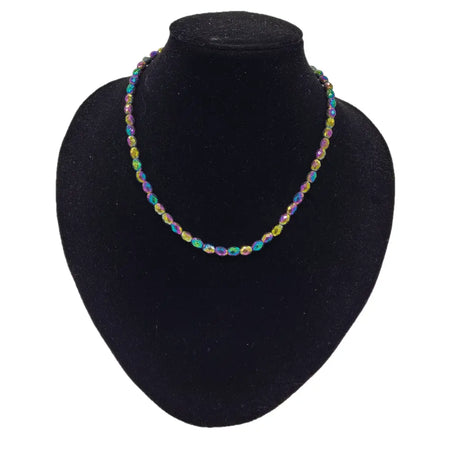 A vibrant rainbow hematite faceted bead necklace with iridescent glass beads in multiple colors