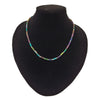 Rainbow hematite peninsular beaded necklace with colorful rectangular iridescent stones and small silver beads