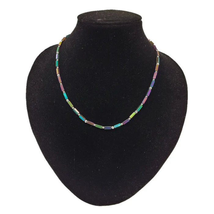 Rainbow hematite peninsular beaded necklace with colorful rectangular iridescent stones and small silver beads