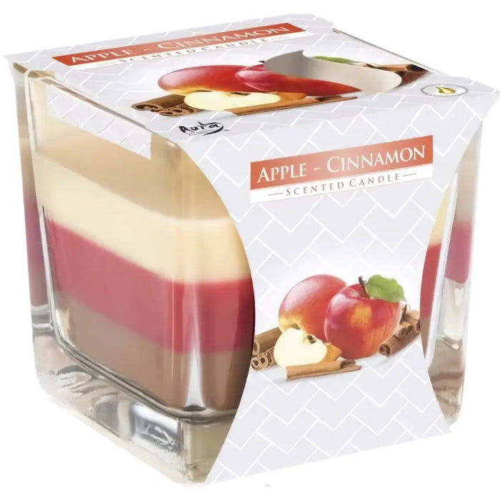 Apple cinnamon scented rainbow jar candle in clear glass with layered red beige and brown wax