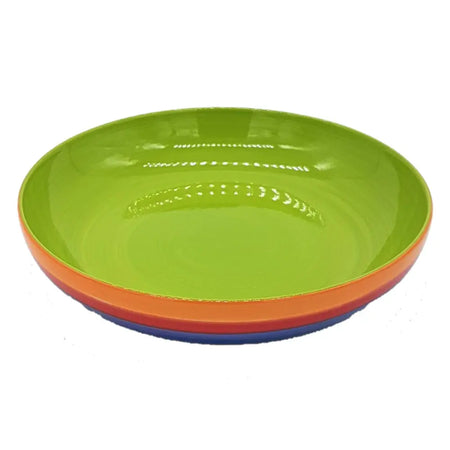 Vibrant ceramic pasta bowl with glossy lime green inside orange midsection and deep blue base 22cm rainbow design