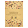 Beige recycled kraft wrapping paper with colorful pink yellow blue and black snowflake patterns on kraft paper sheet