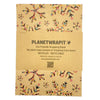 Rainbow snowflake recycled kraft wrapping paper with colorful pink blue yellow and black snowflakes on kraft paper