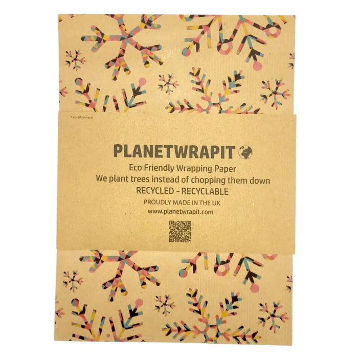 Rainbow snowflake recycled kraft wrapping paper with colorful pink blue yellow and black snowflakes on kraft paper