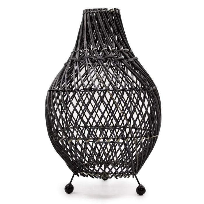 Black rattan table lamp with diamond lattice woven design and three-legged metal base for plug fitting use on table lamp