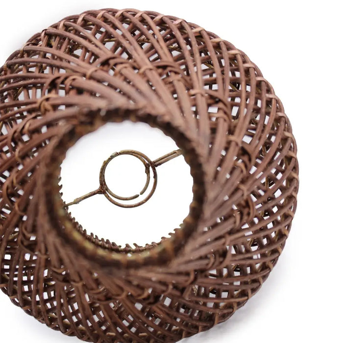 Dark brown rattan table lamp with natural rattan shade and metal rod fixture with plug fitting detail