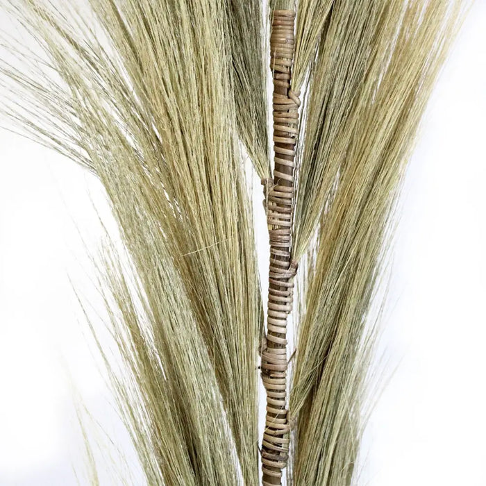 A set of 3 rayung grass brooms with natural blond straw bristles and woven wooden handles measuring 1.6m each