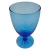 A recycled glass wine glass in ice blue with a hammered texture and gradient finish from light to dark blue