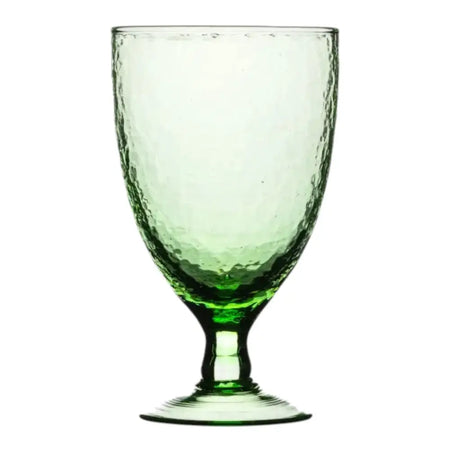 A translucent ice green recycled glass wine glass with a hammered texture and slender stem made from recycled glass