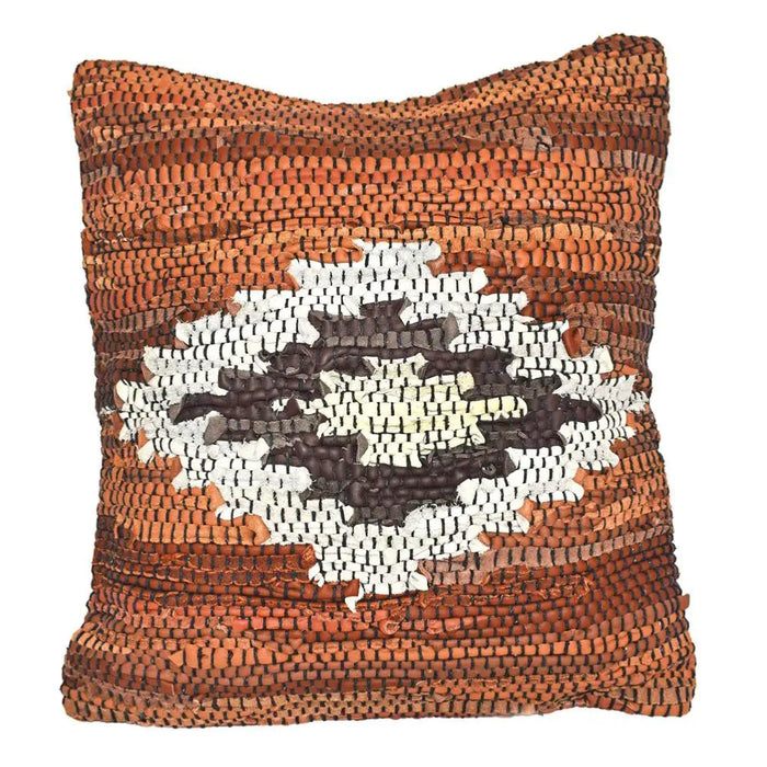 A square handwoven recycled leather rag aztec cushion cover in terracotta with white and dark brown geometric medallion on standard cushion