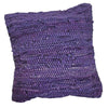 Purple woven standard cushion with chunky knit texture paired with recycled leather rag cushion cover in two colours