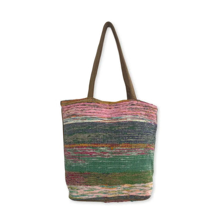 A colorful recycled rugs tote bag with horizontal pink green and brown stripes and a safety zip closure