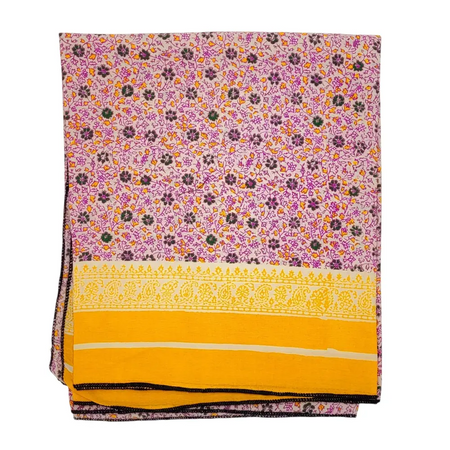 A folded recycled sari scarf with purple orange and green floral pattern on pink cotton with yellow stripes