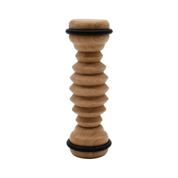 Light brown wooden ribbed foot roller with segmented spiral design and black rubber rings for foot massage