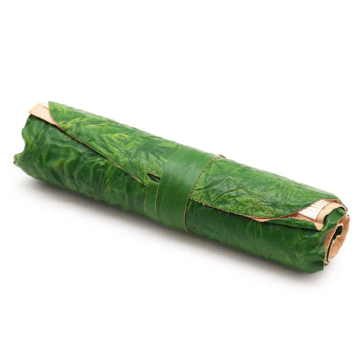 Green rolled leather travel notebook with leather cover embossed leaf pattern and tan stitching 8 by 6 inches