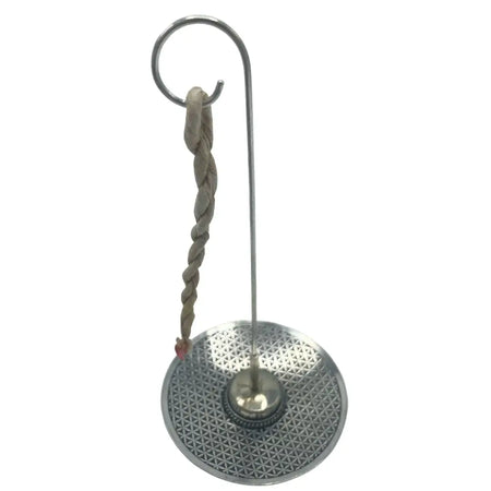 Silver-plated incense burner with geometric flower of life base and beige braided rope hanging from curved hook top