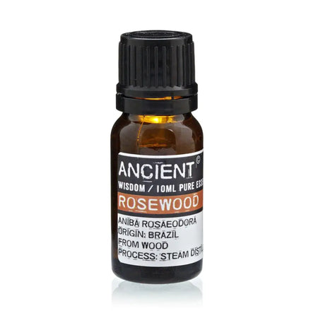A small amber glass bottle with black cap labeled ancient wisdom rosewood 10ml pure rosewood essential oil