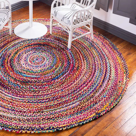 Vibrant multicolored round jute and recycled cotton rug with braided texture and 150cm diameter spiral pattern