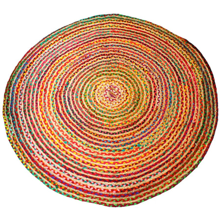 A vibrant round jute and recycled cotton rug with 150cm diameter and multicolored concentric rings