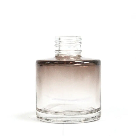 Clear glass round reed diffuser bottle with gradient brown liquid and screw cap for bamboo reed diffuser use