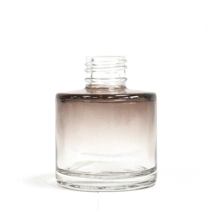 Clear glass round reed diffuser bottle with gradient brown liquid and screw cap for bamboo reed diffuser use