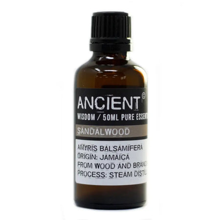 A dark amber glass bottle of 50ml sandalwood amyris essential oil from amyris balsamifera tree via steam distillation