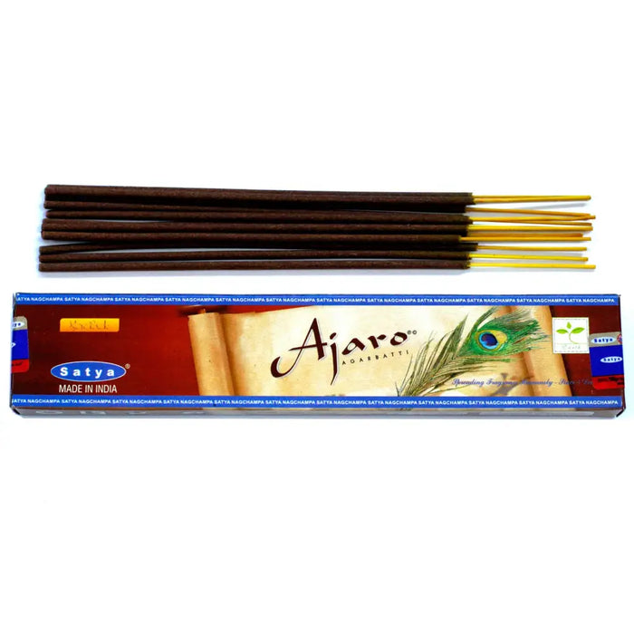 A box of satya incense sticks ajaro with red blue design and peacock feather imagery on ajar agarbattti packaging