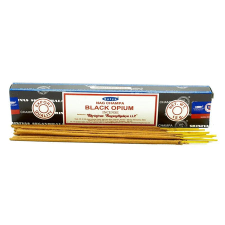 A box of satya incense sticks black opium with black and blue packaging and gold incense sticks showing from the front