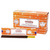 Orange cardboard box of satya incense sticks champa with brown and yellow incense sticks visible inside