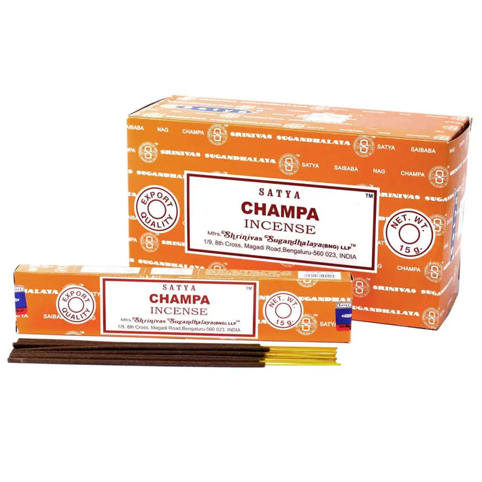 Orange cardboard box of satya incense sticks champa with brown and yellow incense sticks visible inside